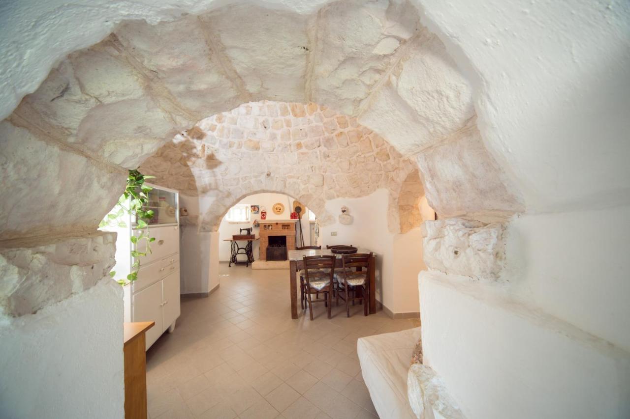 Trulli Girasoli E Viole Cocolicchio Rum bild