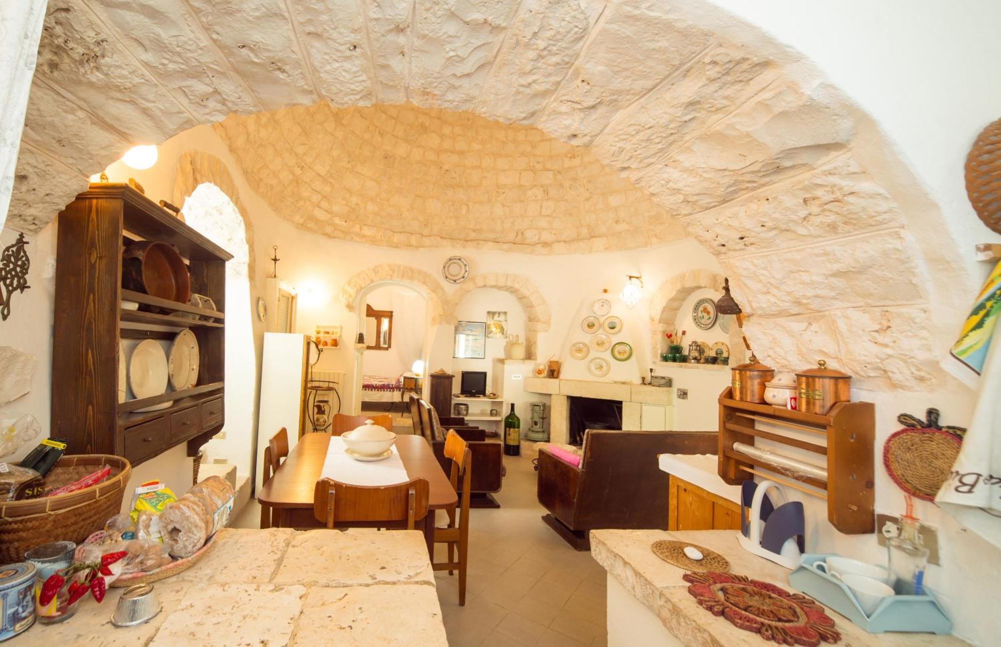 Trulli Girasoli E Viole Cocolicchio Rum bild